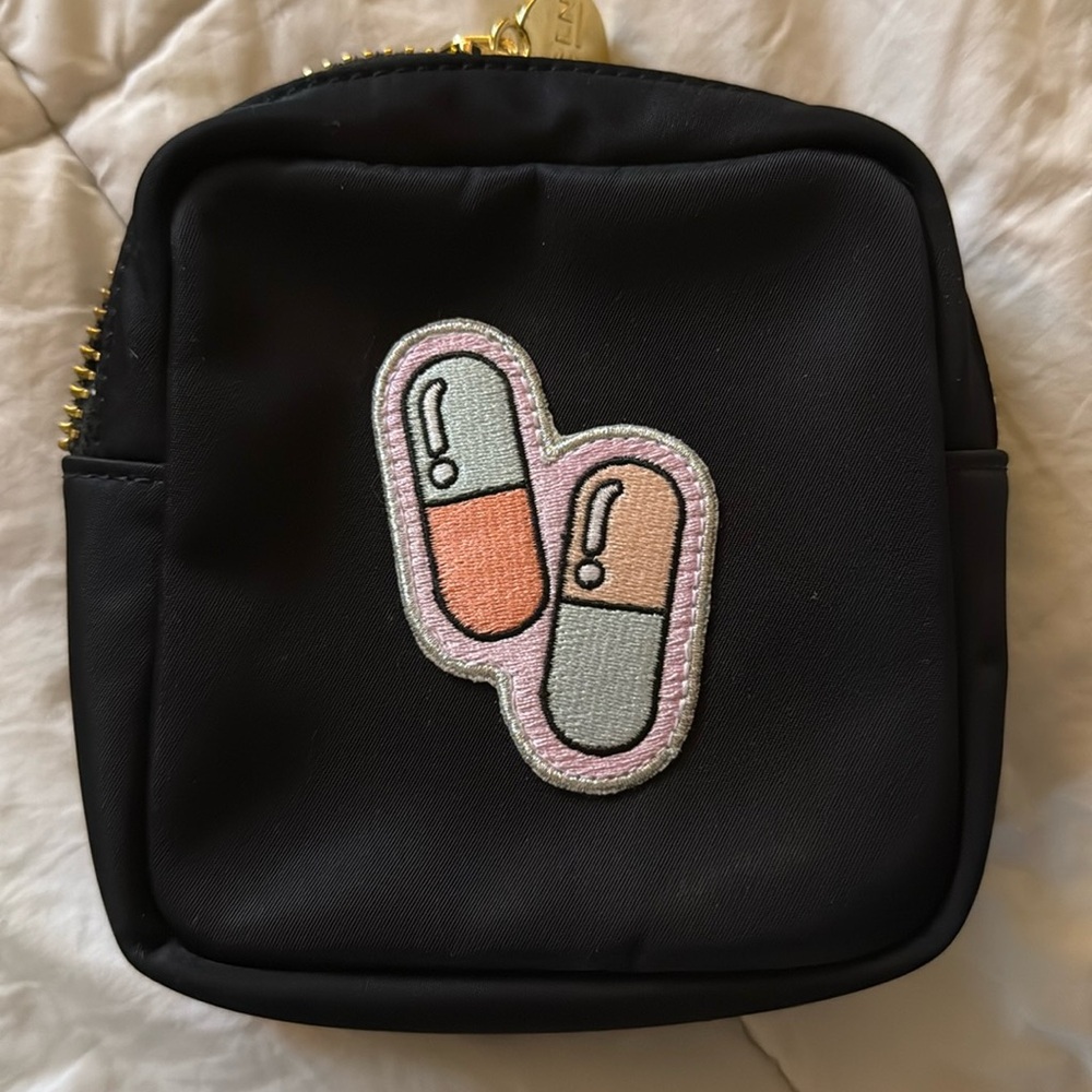 Small Black Pouch with Pill Patch sewn on